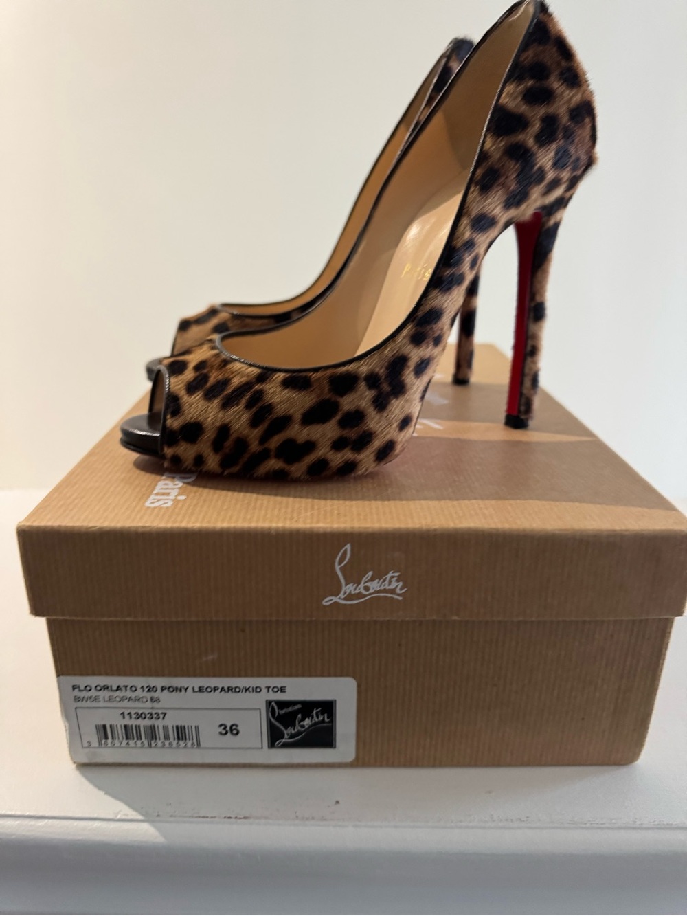Christian Louboutin Leopard Ponyhair Peep-Toe Pumps with Red Sole. Orlando 120